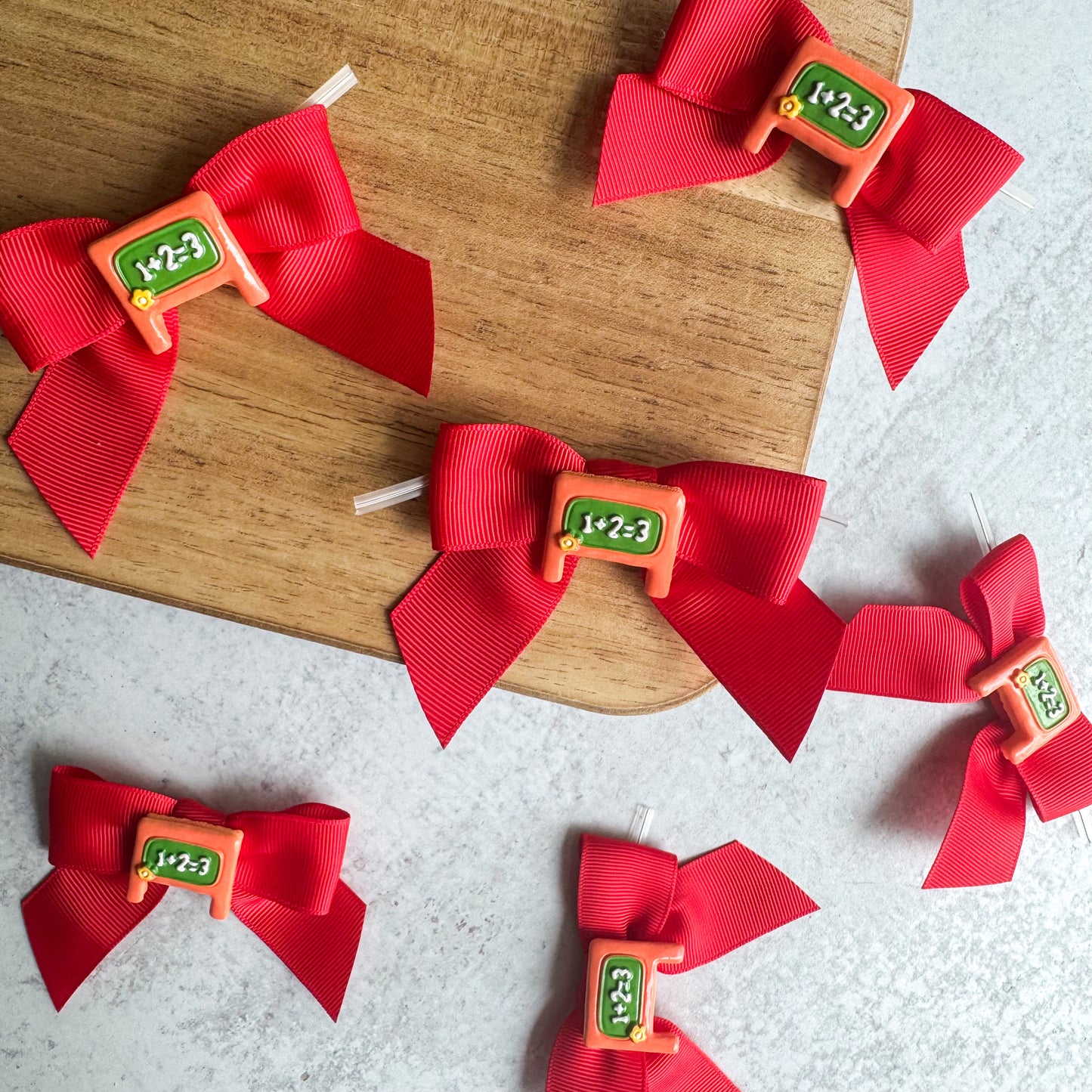 red with chalkboard charm pre-tied 4" grosgrain bows with clear twist ties - set of 25