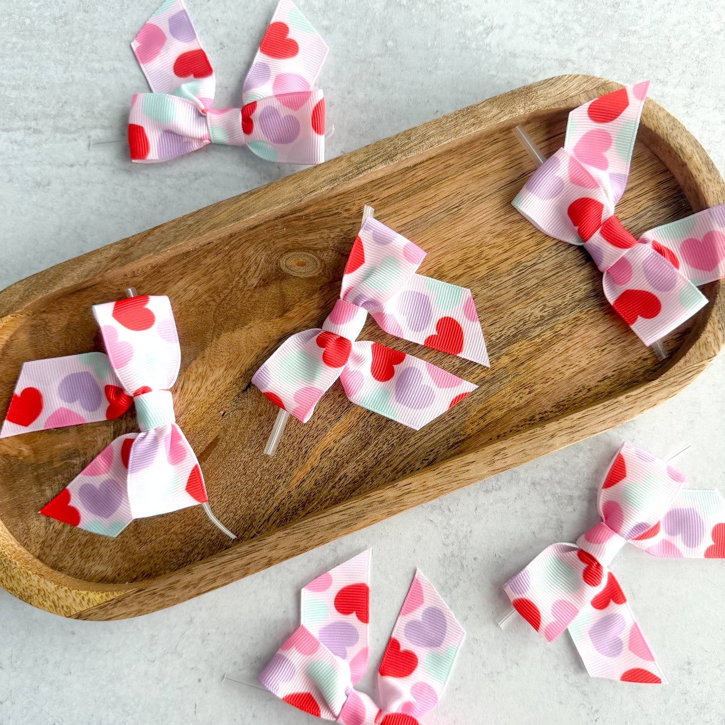 big hearts pre-tied 4" grosgrain bows with clear twist ties - set of 25