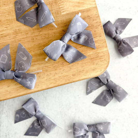 black + white chalkboard doodles pre-tied 4" grosgrain bows with clear twist ties - set of 25