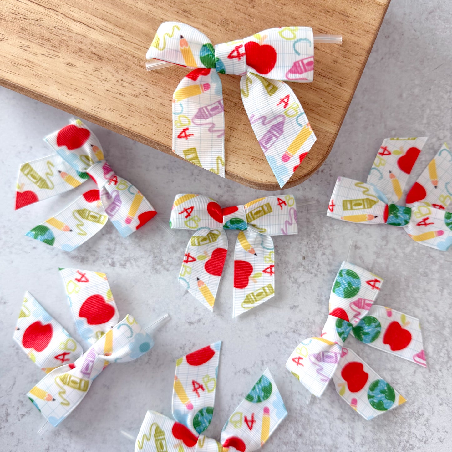 white doodles pre-tied 4" grosgrain bows with clear twist ties - set of 25