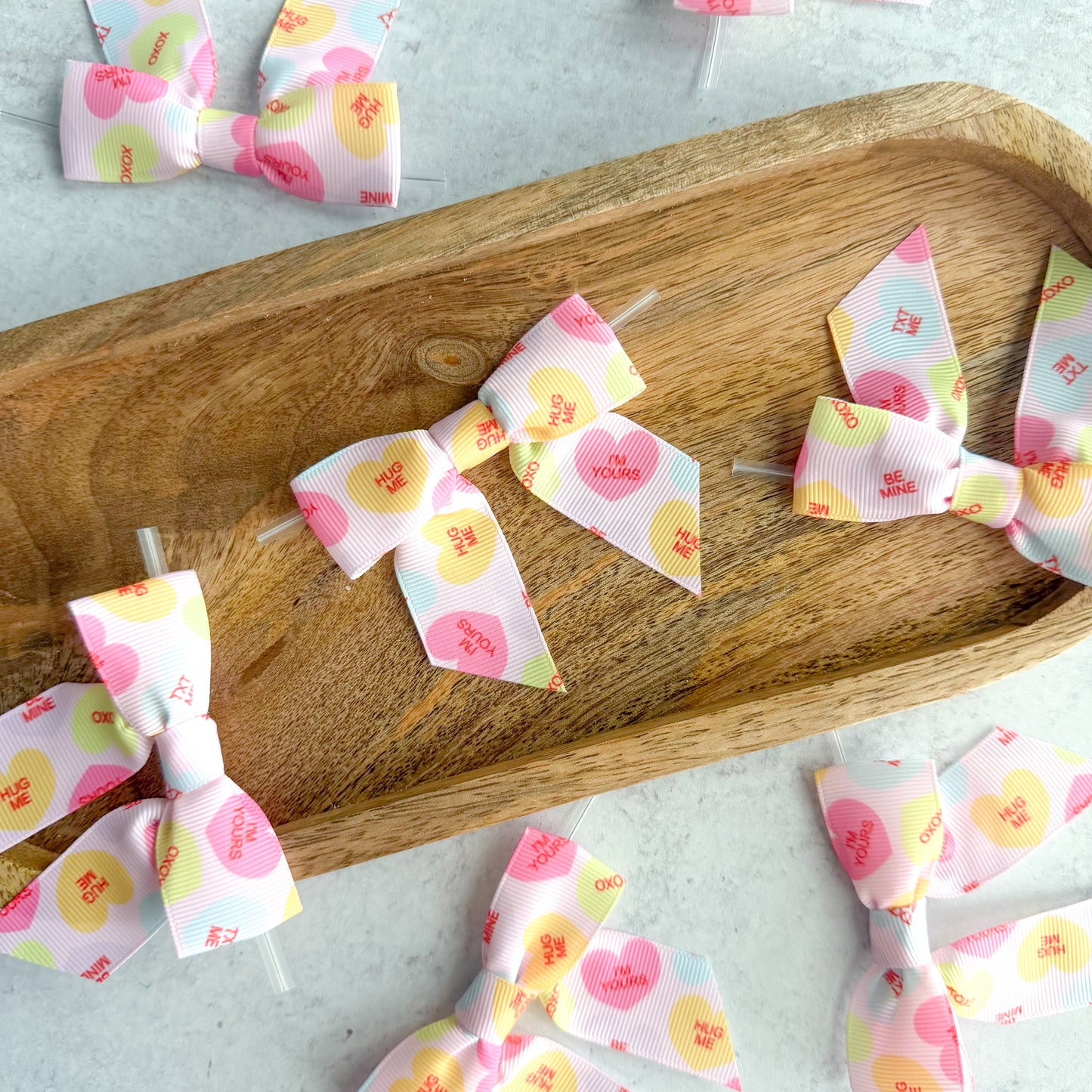conversation hearts pre-tied 4" grosgrain bows with clear twist ties - set of 25