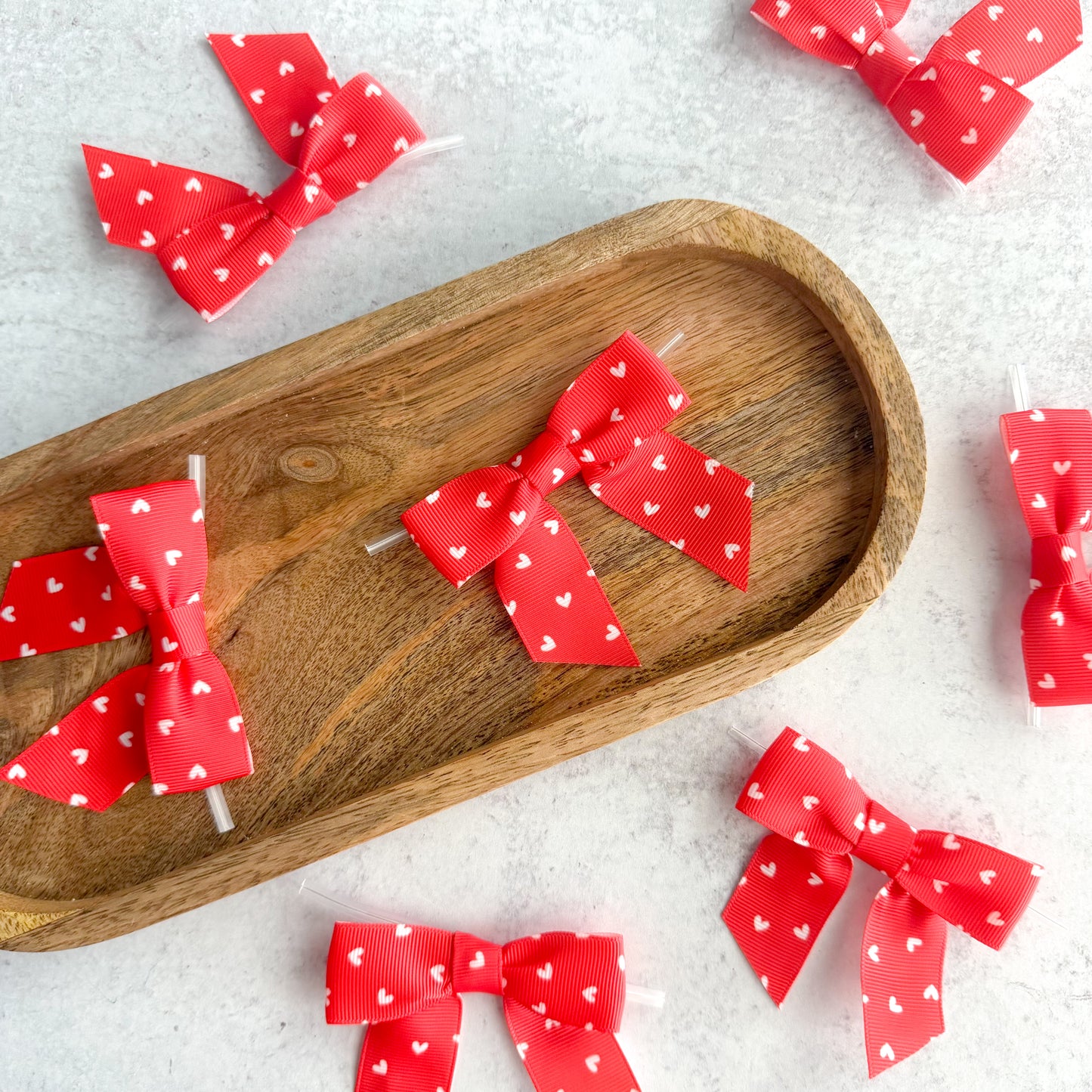 red with white hearts pre-tied 4" grosgrain bows with clear twist ties - set of 25