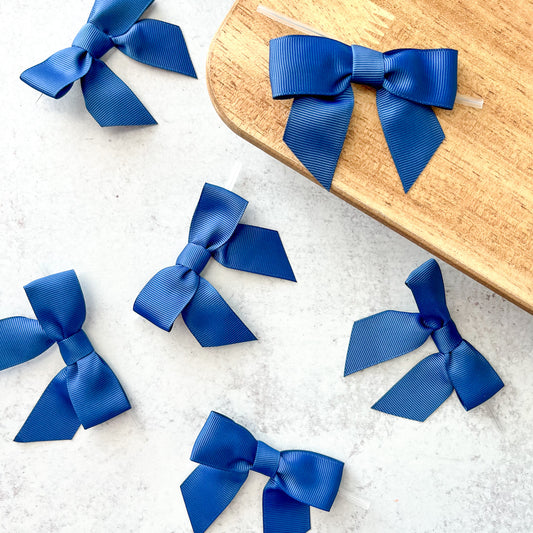 navy blue pre-tied 4" grosgrain bows with clear twist ties - set of 25