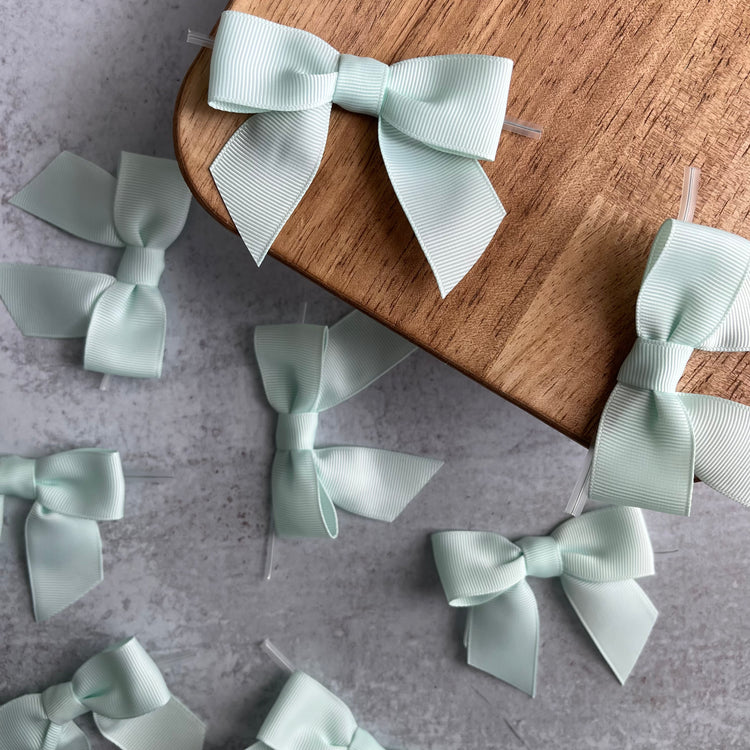 mint pre-tied 4" grosgrain bows with clear twist ties - set of 25