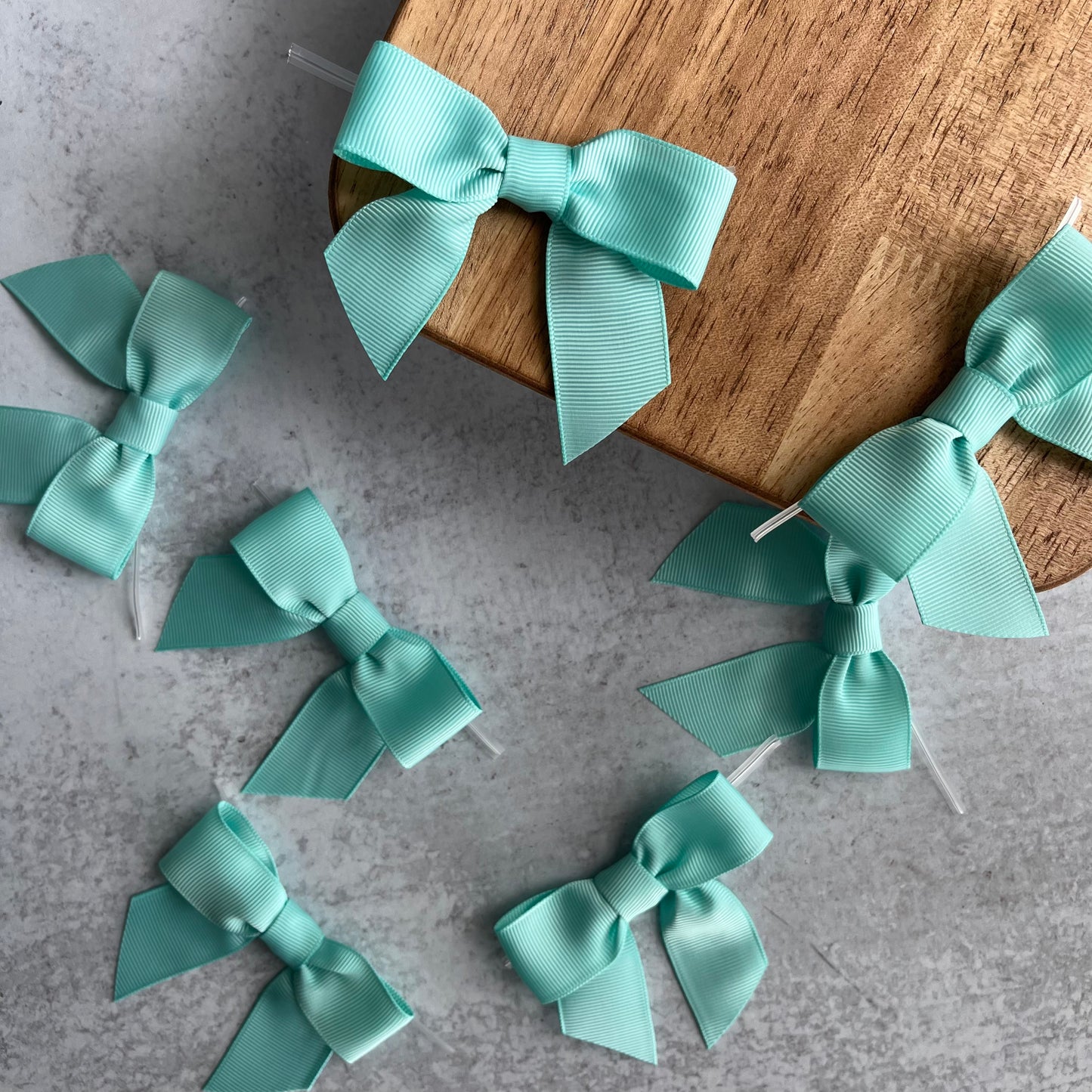 aqua pre-tied 4" grosgrain bows with clear twist ties - set of 25