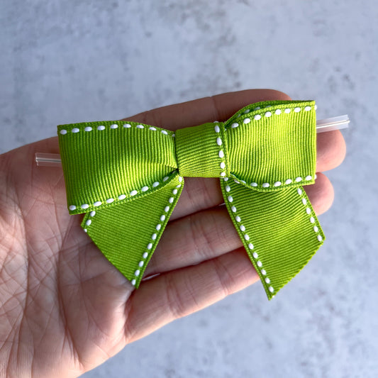 kiwi green pre-tied 4" grosgrain bows with clear twist ties - set of 25